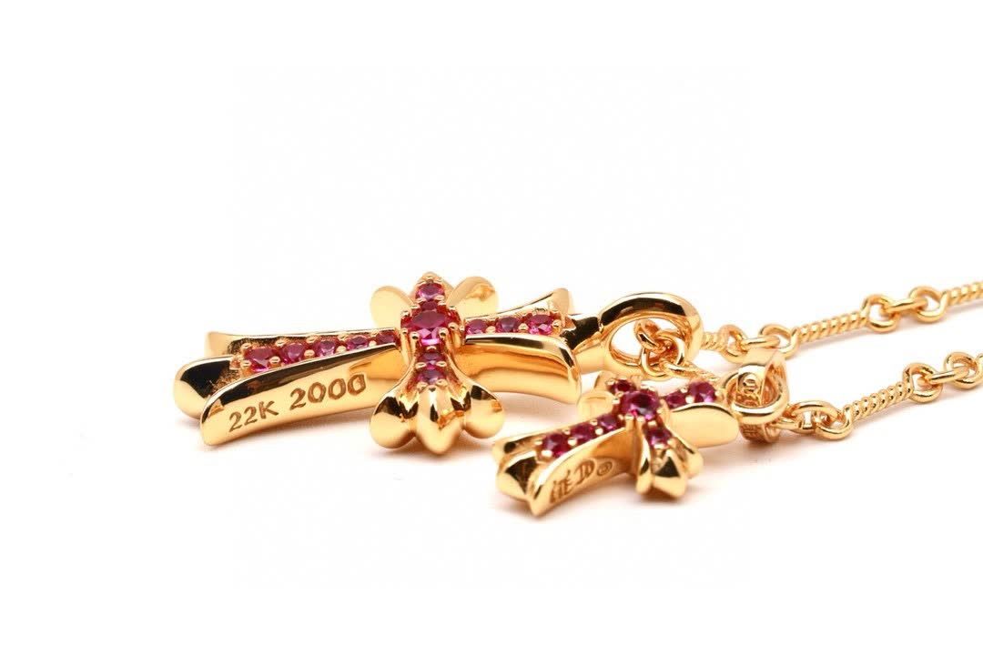 Chrome Hearts Gold Cross Pendant with Pink Stones
